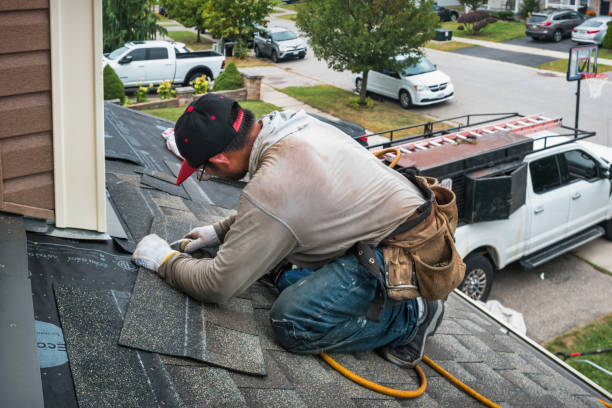 Professional Roofing technician working in West Greenwich, RI